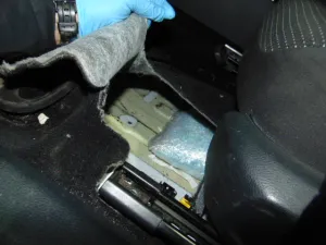 Fentanyl concealed in floorboard.